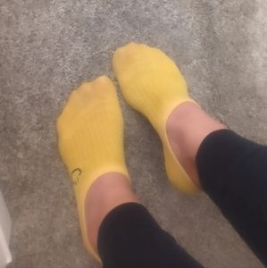 Worn yellow Thin yellow no show socks